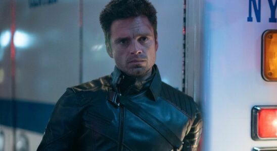 Sebastian Stan leaning against an ambulance with a look of concern in The Falcon and the Winter Soldier.