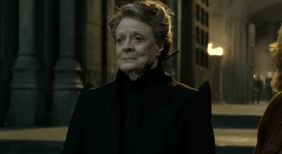 Dame Maggie Smith stands outside at night, with a grim look on her face in Harry Potter and the Deathly Hallows - Part 2.