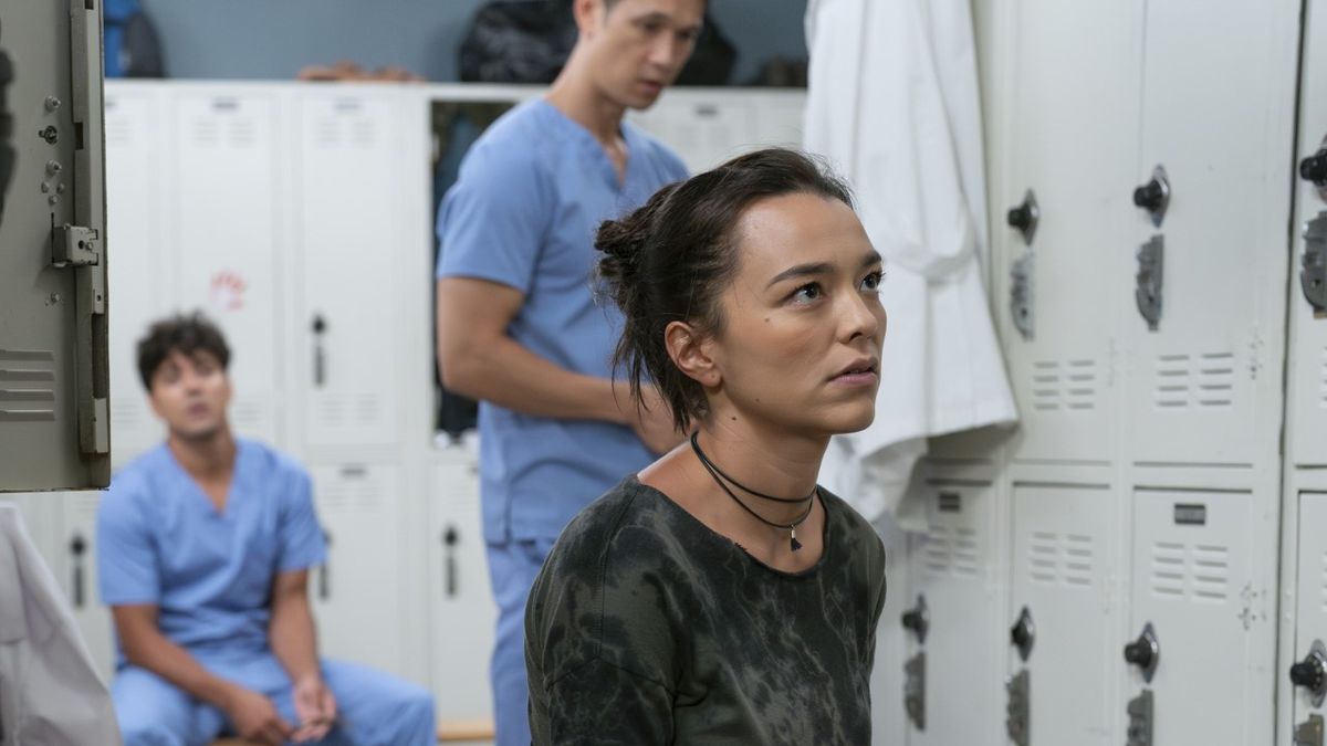 Mika Yasuda (Midori Francis) is shown on Grey&#039;s Anatomy with Lucas Adams and Blue Kwan in the background.