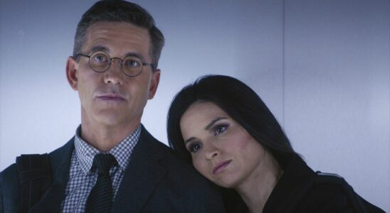 Katrina Law leaning her head on Brian Dietzen's shoulder in NCIS elevator