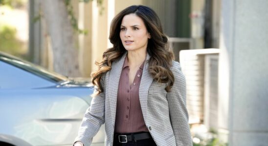 Katrina Law's Jessica Knight walking away from silver car in NCIS