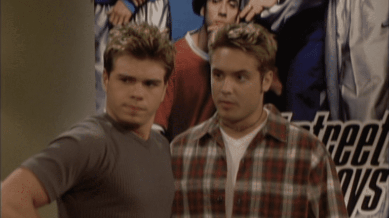 Matthew Lawrence as Jack and Will Friedle as Eric standing in front of a Backstreet Boys poster on Boy Meets World