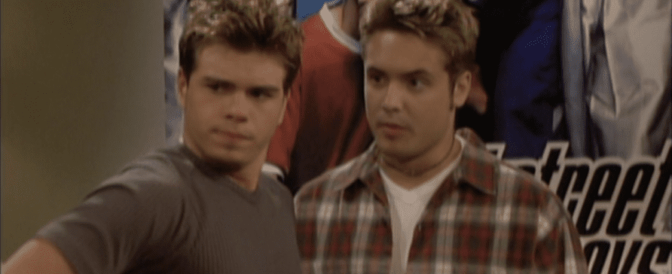 Matthew Lawrence as Jack and Will Friedle as Eric standing in front of a Backstreet Boys poster on Boy Meets World