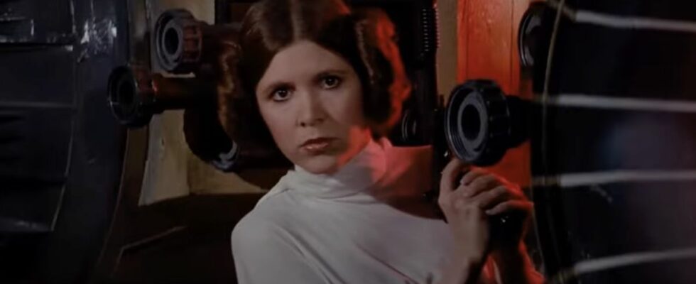 Carrie Fisher's Leia holding blaster at the beginning of A New Hope