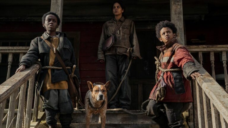 June (Halle Berry), Nolan (Percy Daggs IV) and Sam (Anthony B. Jenkins) with their dog on a porch in Never Let Go