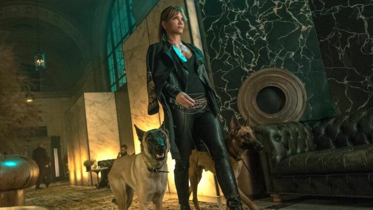 Halle Berry's Sofia walking with her dogs in John Wick 3