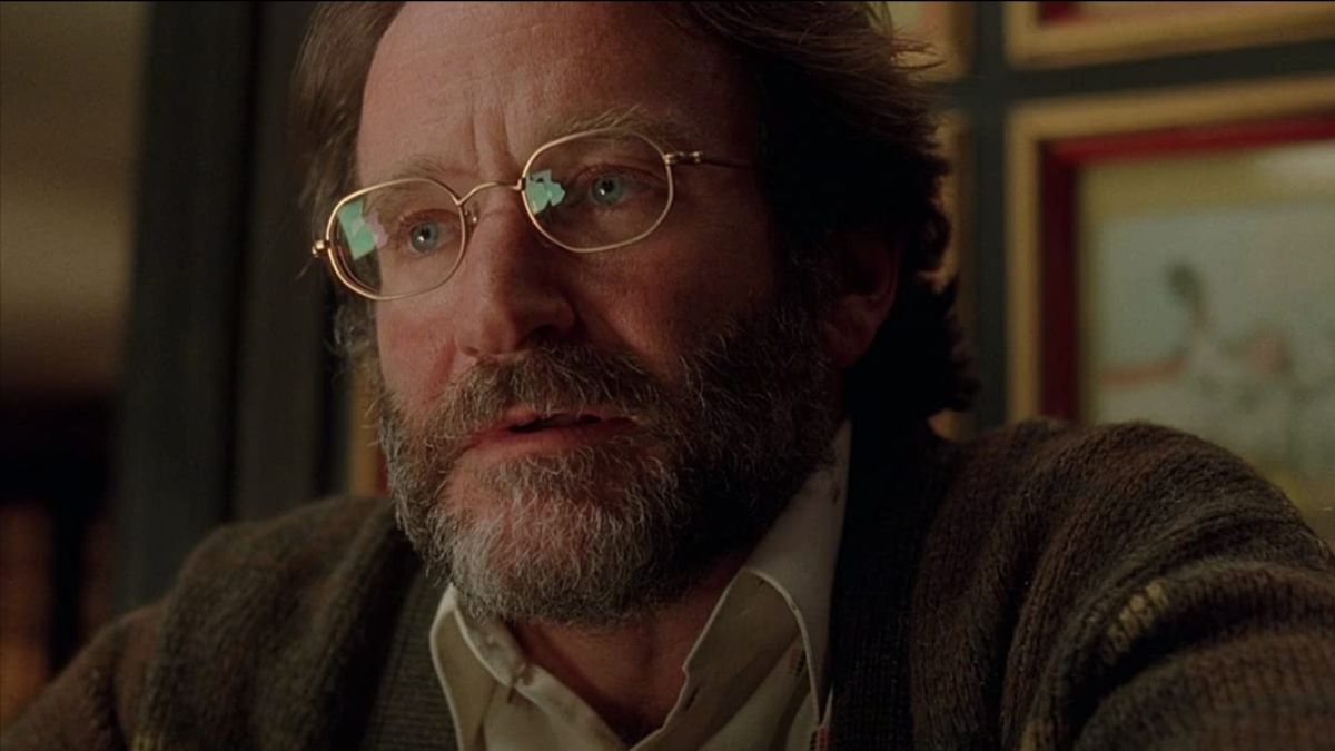 Robin Williams sits solemnly in Good Will Hunting.