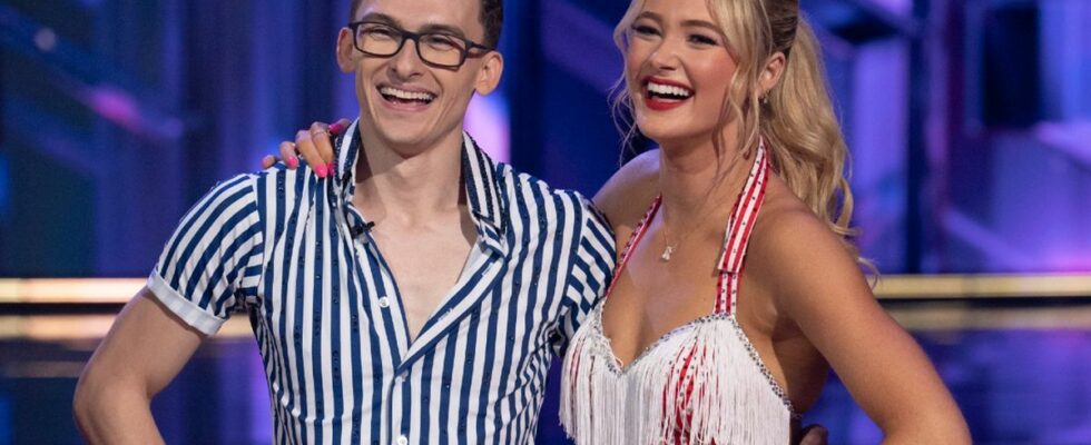 Stephen Nedoroscik and Rylee Arnold standing arm in arm and smiling on Dancing with the Stars.