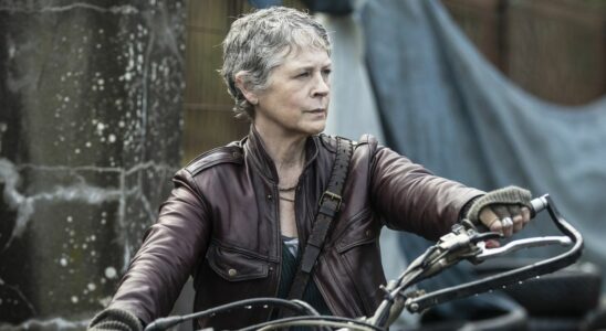 Carol sitting on motorcycle in The Walking Dead: Daryl Dixon - The Book of Darol