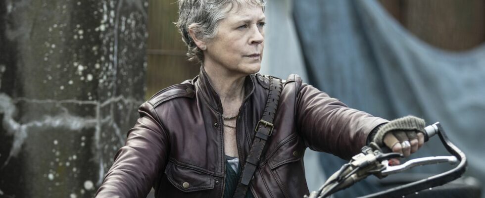 Carol sitting on motorcycle in The Walking Dead: Daryl Dixon - The Book of Darol