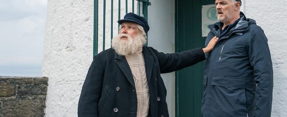 Lighthouse keeper Brennan (Conleth Hill) manhandles crime scene cleaner Wicky (Greg Davies) in season 3 of black comedy The Cleaner