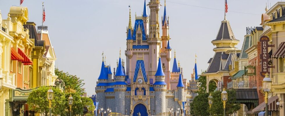 Cinderella Castle in the distance of Main Street U.S.A with crowds