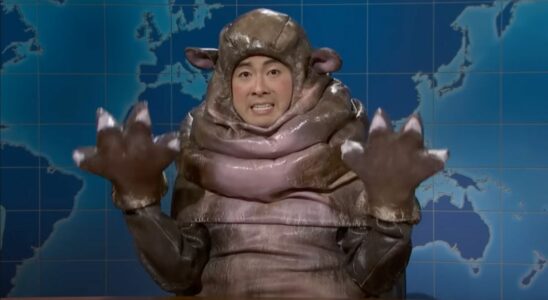 Bowen Yang dressed as Moo Deng the viral hippo on SNL's Weekend Update