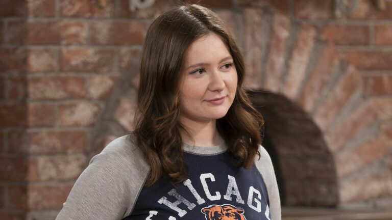 Harris in Chicago Bears shirt working at Lunchbox in The Conners Season 6