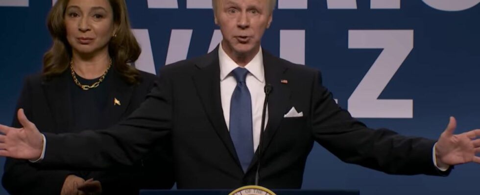 Dana Carvey portrays Joe Biden on the Saturday Night Live Season 50 premiere, as Maya Rudolph (as Kamala Harris) stands behind him.