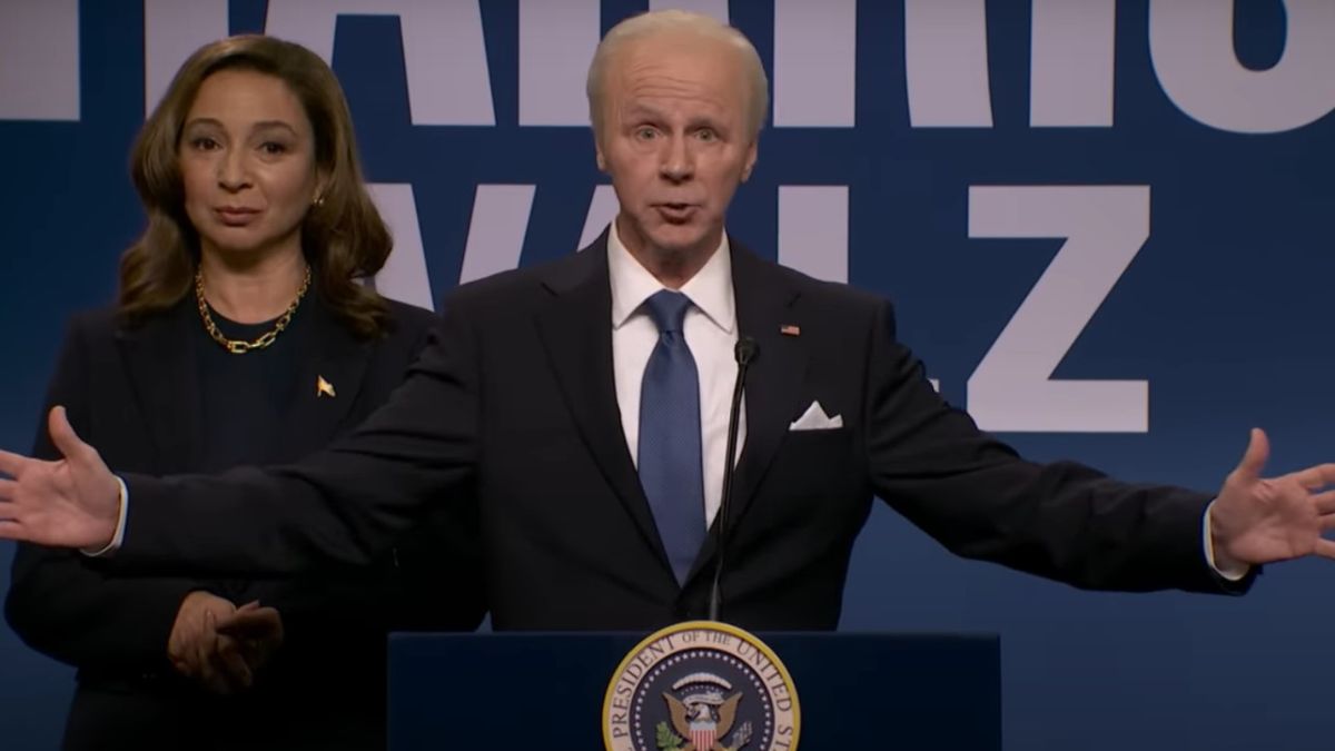 Dana Carvey portrays Joe Biden on the Saturday Night Live Season 50 premiere, as Maya Rudolph (as Kamala Harris) stands behind him.