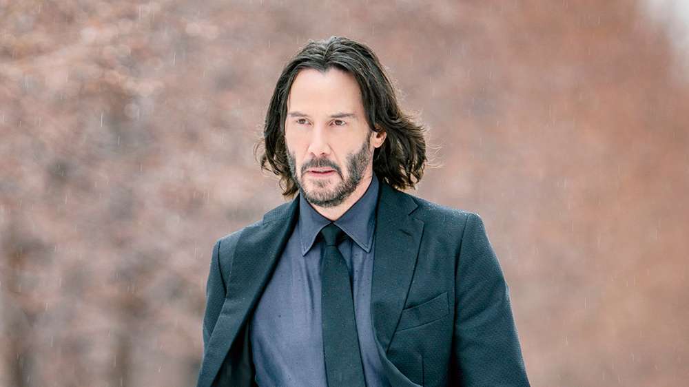 Keanu Reeves exprime son désir pour John Wick 5 tout en doutant de l'état de ses genoux pour un nouveau film